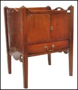 A 19th century George 3rd solid mahogany tray top nightstand cabinet. The top with a pierced gallery