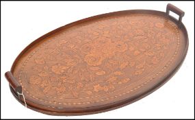 A 19th century Dutch Marquetry gallery tray of walnut construction having boxwood and fruit wood