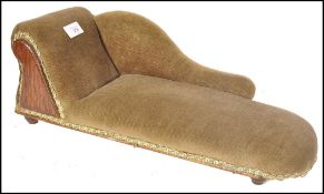 An early 20th century Harrods of London salesman's / apprentice piece chaise longue. Of small form