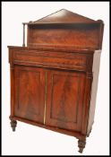 A fine 19th century Regency mahogany chiffonier sideboard. Raised on shaped supports with twin