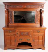 Late Victorian mahogany mirror back sideboard by Maple & Co. Ltd., the arched mirrored back with