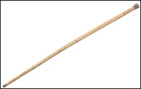A 19th century nautical walking stick cane of shark vertebrae and baleen construction being of