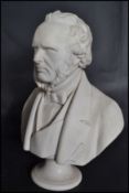 A 19th century Parian bust of Rt Hon W.E Gladstone MP, raised on a circular socle base and inscribed