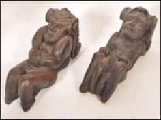 A pair of 18th / 19th century Gothic architectural carved pine wall brackets - mounts. Of flemish