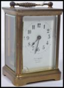 An early 20th century brass carriage clock with en