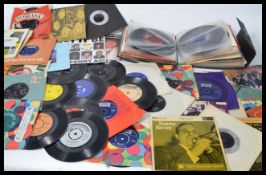 A good collection of 45's - records to include man