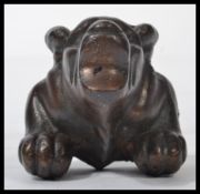 A late 19th century bronze paperweight in the form