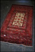 A stunning Persian woolen rug having central beige