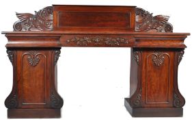 A 19th century Regency mahogany twin pedestal side