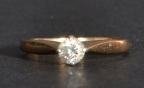 A 9ct gold single stone ring having a diamond of a