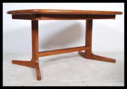 A retro 1960's teak wood long extending dining tab