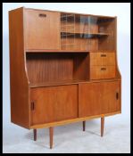 A vintage mid century teak wood sideboard of Danis