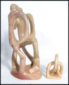 Two vintage 20th century stone carvings sculpture