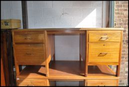 A mid century large Air Ministry twin pedestal oak