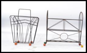 Two vintage retro 20th century Sputnik atomic magazine racks of tubular form having coloured ball