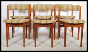 A set of six retro 20th Century Danish inspired dining chairs. Woollen seat and back pad