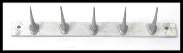 A vintage retro 20th century cast aluminium coat rack in the form of rhino horns. Please see images.