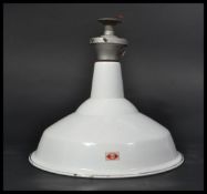 An early 20th century white  enamel painted metal factory pendant light by Benzamin, bearing