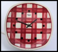 A  retro 20th century Smiths Sectric Electric TG Green Gingham wall clock plate. With fitted