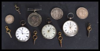 A collection  of 3 silver open faced pocket / fob watches, all marked silver / fine silver