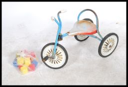 A collection of vintage childrens toys to include a Mobo Trike, a dolls high chair etc please