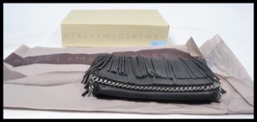 An original Stella McCartney designer evening bag, retaining all original packaging. The bag