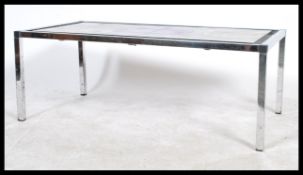 A vintage / retro 20th Century chrome framed tied topped coffee table, the tile top having a