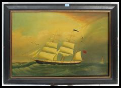 A 20th century oil on canvas painting of a maritime scene with clipper ship at sea. Set in an