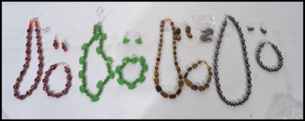 A collection of four good gemstone and other bead