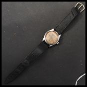 A vintage 20th century Omega 1940's stainless steel cased wrist watch. The champagne dial having