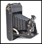 A vintage 20th century Voitlander bellows camera complete in carry case. Model 1:7.7.