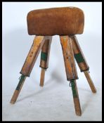 A vintage mid century H. Hunt & Son, Liverpool pommel horse being raised on adjustable squared