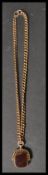 A hallmarked 9ct golf pocket watch Albert chain with a hallmarked 9ct gold revolving blood stone