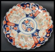 A 19th century Chinese Imari pattern charger havin