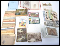 A collection of vintage 20th century postcards to include local, greeting, photographic equestrian