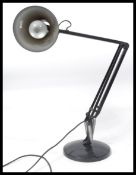 A 20th century vintage Anglepoise desk lamp in the manner of Herbert Terry. Black colourway with