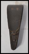 A 19th century leather scissor case with a  set of four non matching graduating haberdashery