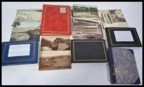 A collection of vintage postcards dating from the early 20th century to include many local interest,