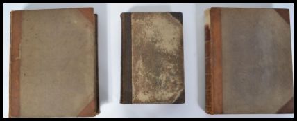 2 leather tooled editions of Henry's bible volumes one and two together with a bound copy of All The