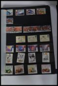 A collection of 3x albums of unused decimal stamps - various issues and presentation packs