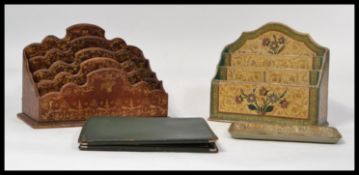 Two vintage 20th century papier mache desk tidies of sectional form the first being covered with a