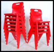 A set of ten retro style stacking chairs in the manner of Kartell, each chair moulded in a single