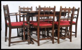 A 20th century Ercol Old Colonial beech and elm wood refectory dining table and chairs together with