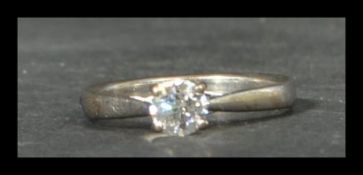 A hallmarked 18ct white gold and diamond solitaire ring by Mappin and Webb. No obvious inclusions