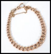 A 9ct gold hallmarked of graduating links curb bracelet weighing 20.9g