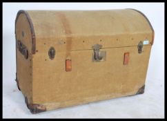A 19th century Victorian green canvas bound wooden steamer trunk chest with dome top, tray to inner.