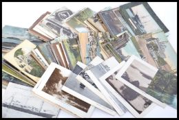A collection of vintage 20th century postcards to include shipping , topographical , overseas