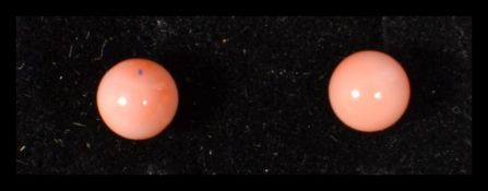 A pair of 9ct gold and coral stud earrings complete in jewellery box.