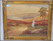An early 20th century water colour painting of a lady walking through a hilly landscape with water
