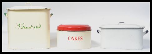 A vintage 20th century enamel  hinged lidded two tone cake tin on, notation to the front reading